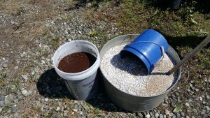 Add the coconut core to the perilite/soil mixture and you have great potting soil that retains water well. 